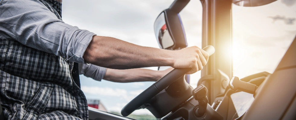 man driving truck at his own cost