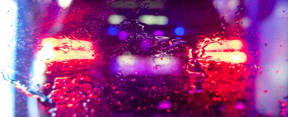 Car windshield wet from car wash
