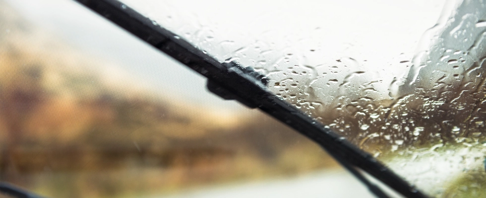 windscreen wipers running on a rainy day