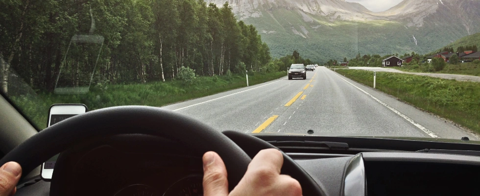 man driving with clear window