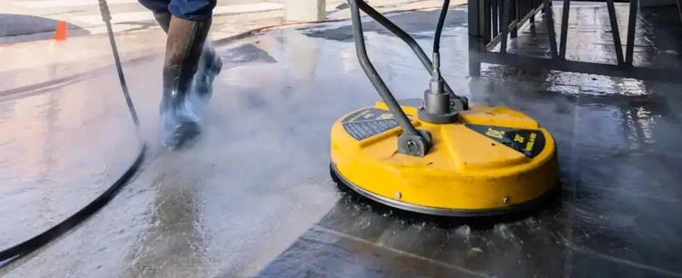A person pressure washing