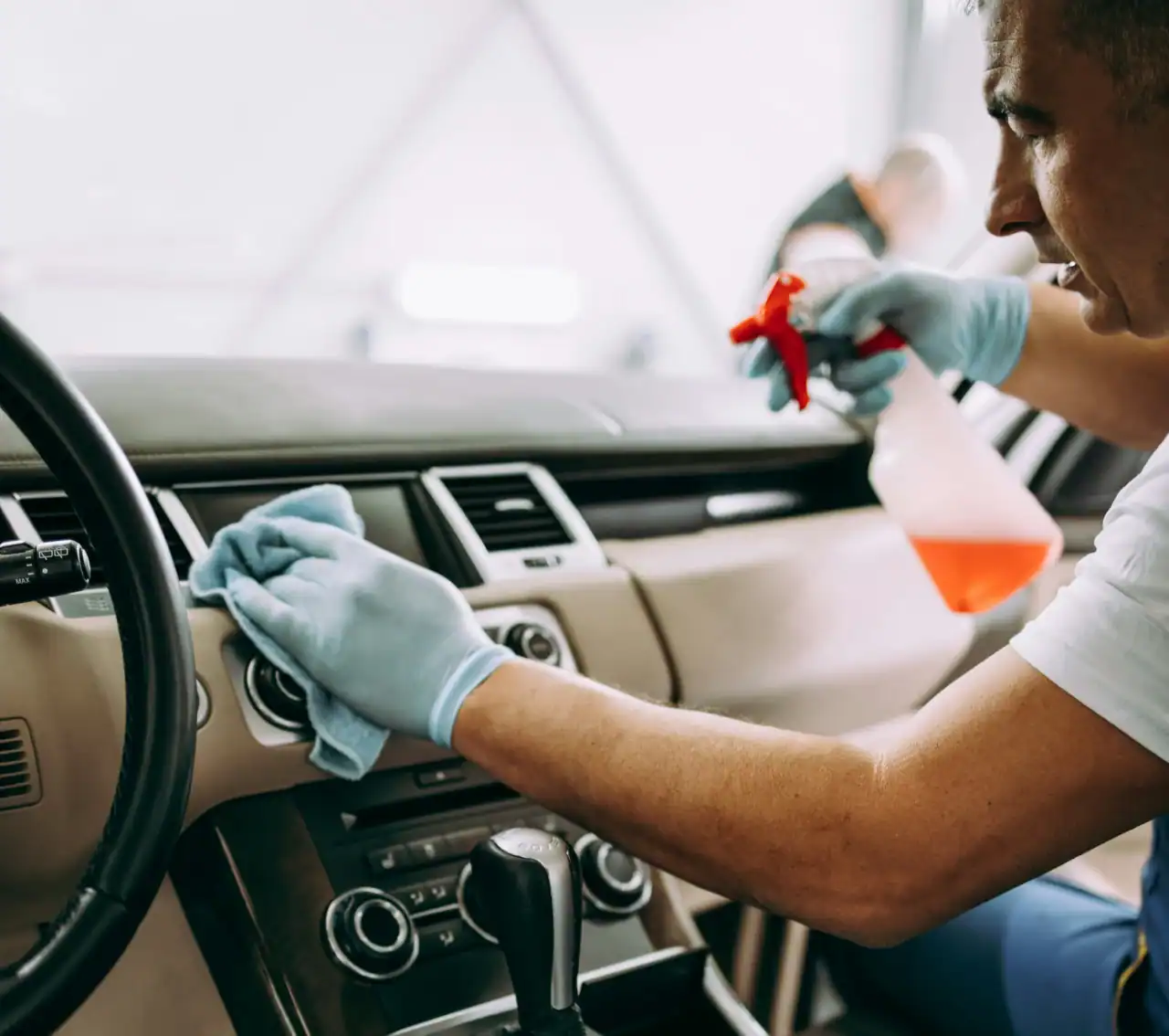 a car interior being cleaned as part of a thorough car detailing process